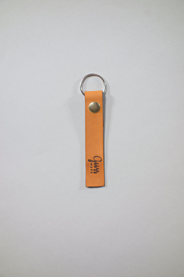 Schlüsselanhänger aus Leder mit Druckknopf & GUSSWERK Logobrand
