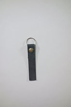 Schlüsselanhänger aus Leder mit Druckknopf